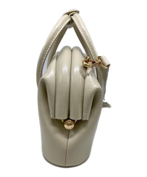 osoi（オソイ）osoi (オソイ) CIRCLE MINI ベージュの古着・服飾アイテム