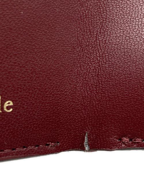 Kate Spade（ケイトスペード）Kate Spade (ケイトスペード) コンパクトウォレット ボルドーの古着・服飾アイテム