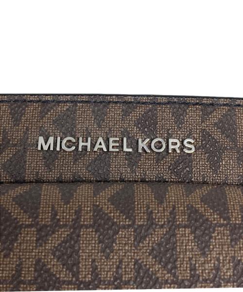 MICHAEL KORS（マイケル・コース）MICHAEL KORS (マイケルコース) ACCESSORIES SLIM PHONE XBODY ベージュの古着・服飾アイテム