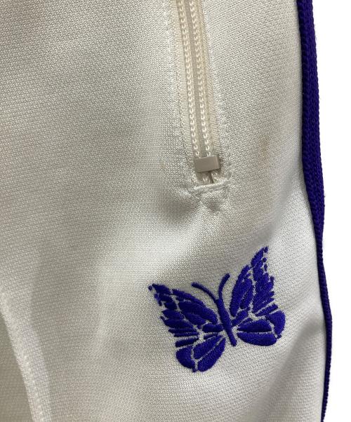 Needles（ニードルズ）Needles (ニードルズ) トラックパンツ アイボリー×パープル サイズ:Mの古着・服飾アイテム