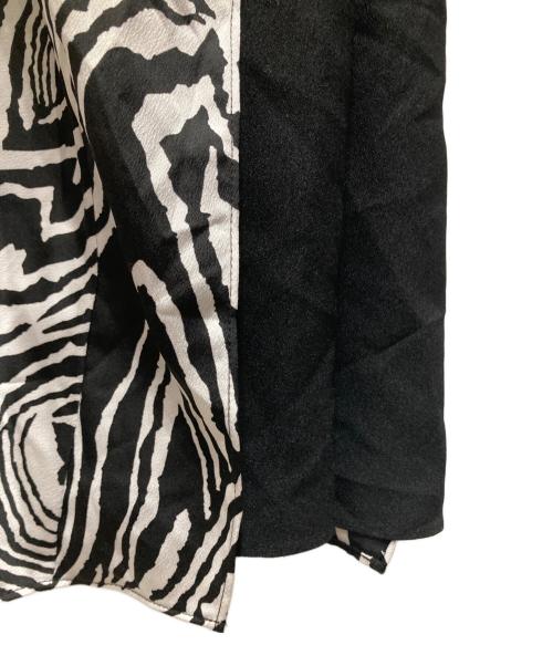 DIANE VON FURSTENBERG（ダイアンフォンファステンバーグ）DIANE VON FURSTENBERG (ダイアンフォンファステンバーグ) カシュクールワンピース ホワイト×ブラック サイズ:00 未使用品の古着・服飾アイテム