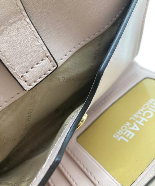 MICHAEL KORS（マイケル・コース）MICHAEL KORS (マイケル・コース) 2つ折り財布 ホワイト×ピンク 未使用品の古着・服飾アイテム