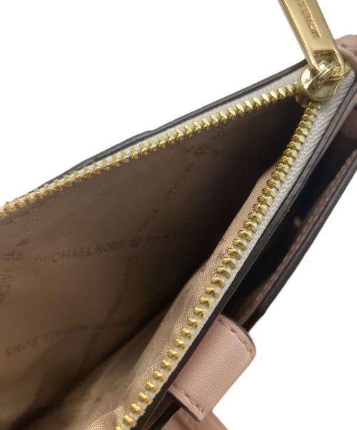 MICHAEL KORS（マイケル・コース）MICHAEL KORS (マイケル・コース) 2つ折り財布 ホワイト×ピンク 未使用品の古着・服飾アイテム