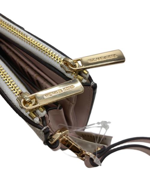 MICHAEL KORS（マイケル・コース）MICHAEL KORS (マイケル・コース) 2つ折り財布 ホワイト×ピンク 未使用品の古着・服飾アイテム