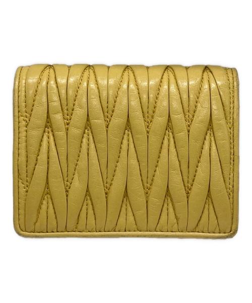 MIU MIU（ミュウミュウ）MIU MIU (ミュウミュウ) マテラッセレザー財布 イエローの古着・服飾アイテム