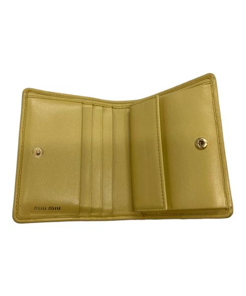 MIU MIU（ミュウミュウ）MIU MIU (ミュウミュウ) マテラッセレザー財布 イエローの古着・服飾アイテム