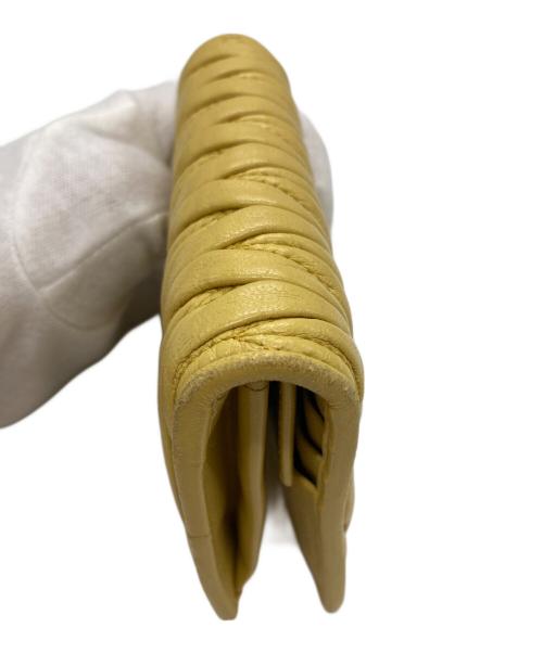 MIU MIU（ミュウミュウ）MIU MIU (ミュウミュウ) マテラッセレザー財布 イエローの古着・服飾アイテム