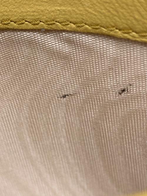 MIU MIU（ミュウミュウ）MIU MIU (ミュウミュウ) マテラッセレザー財布 イエローの古着・服飾アイテム