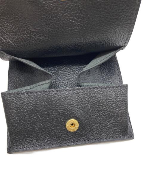 IL BISONTE（イル ビゾンテ）IL BISONTE (イル ビゾンテ) 差込フラップ2つ折りウォレット ブラックの古着・服飾アイテム