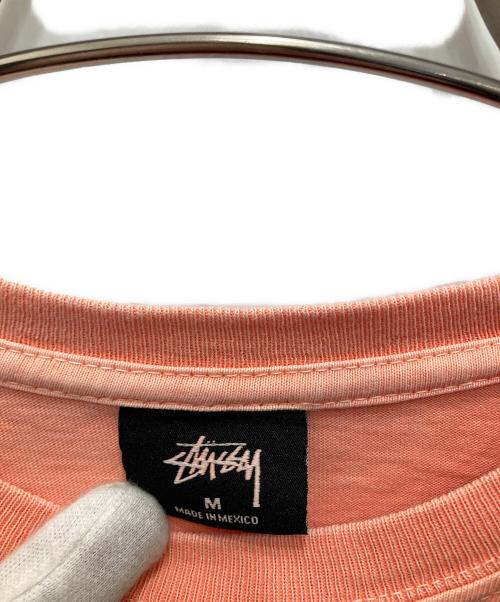 stussy（ステューシー）stussy (ステューシー) 半袖カットソー オレンジ サイズ:Mの古着・服飾アイテム