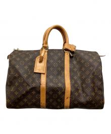 LOUIS VUITTON（ルイ ヴィトン）の古着「トラベルバッグ」｜ブラウン