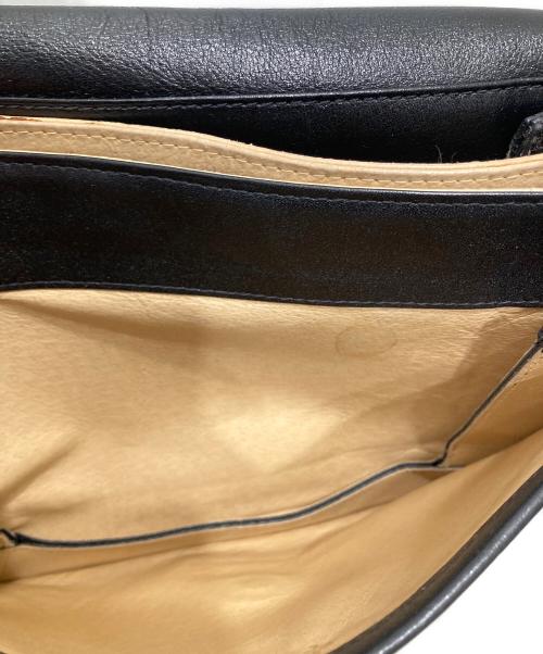 MCM（エムシーエム）MCM (エムシーエム) レザーフラップショルダーバッグ ブラックの古着・服飾アイテム