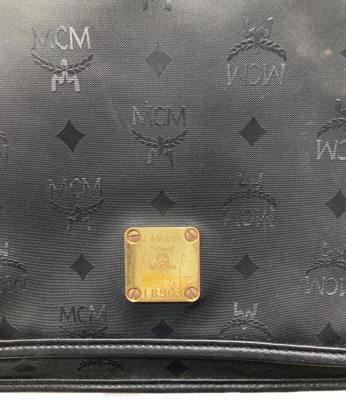 MCM（エムシーエム）MCM (エムシーエム) レザーフラップショルダーバッグ ブラックの古着・服飾アイテム