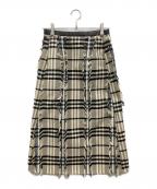 TOMORROW LAND collectionトゥモローランドコレクション）の古着「カットタータンチェック トラペーズスカート」｜ベージュ×ブラック