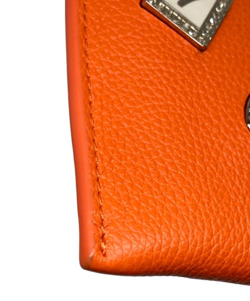 SALON DE ALFURD（サロン・ド・アルファード）SALON DE ALFURD (サロン・ド・アルファード) ルクーチェL字ファスナー ミニ財布 オレンジの古着・服飾アイテム