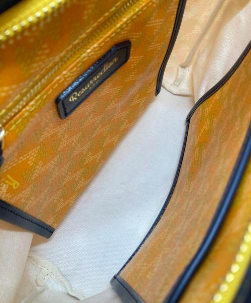 Resurrection（レザレクション）Resurrection (レザレクション) ハンドトートバッグ オレンジの古着・服飾アイテム