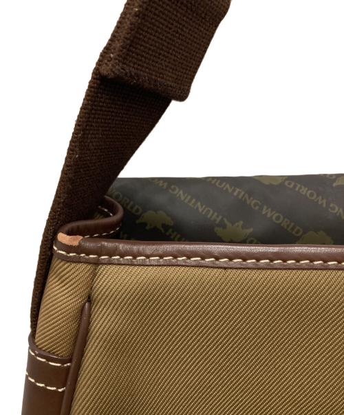 HUNTING WORLD（ハンティングワールド）HUNTING WORLD (ハンティングワールド) キャンバスメッセンジャーバッグ ベージュの古着・服飾アイテム