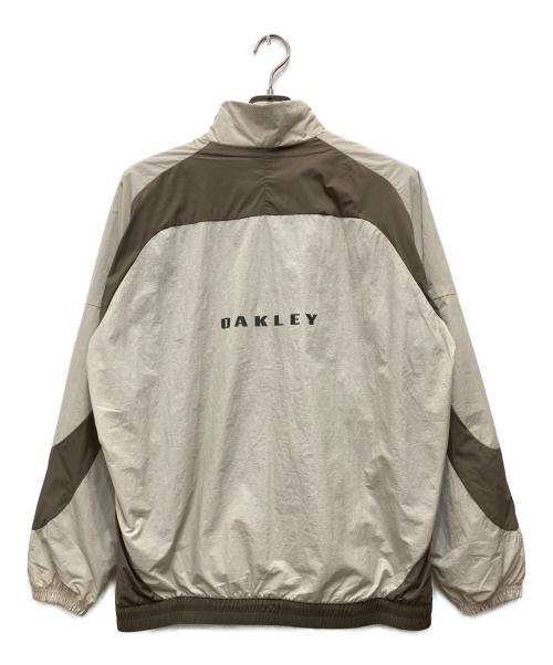 OAKLEY（オークリー）OAKLEY (オークリー) NEW RETRO WIND JACKET アイボリー×ベージュ サイズ:Mの古着・服飾アイテム