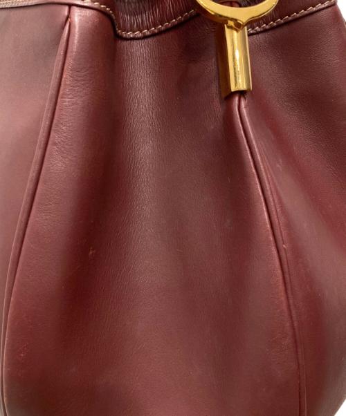 Cartier（カルティエ）Cartier (カルティエ) ヴィンテージ巾着ショルダーバッグ ボルドーの古着・服飾アイテム