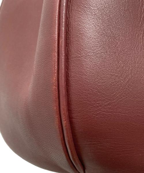Cartier（カルティエ）Cartier (カルティエ) ヴィンテージ巾着ショルダーバッグ ボルドーの古着・服飾アイテム