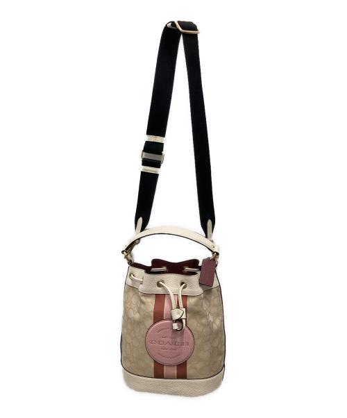 COACH（コーチ）COACH (コーチ) Dempsey Drawstring Bucket Bag ベージュの古着・服飾アイテム