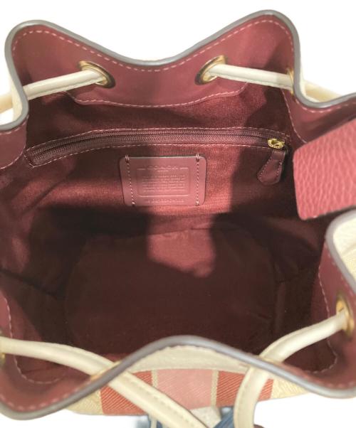 COACH（コーチ）COACH (コーチ) Dempsey Drawstring Bucket Bag ベージュの古着・服飾アイテム