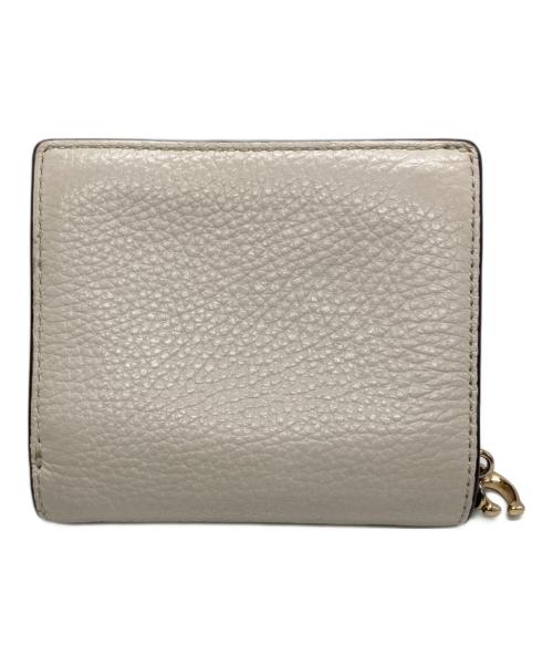 COACH（コーチ）COACH (コーチ) 2つ折り財布 アイボリーの古着・服飾アイテム