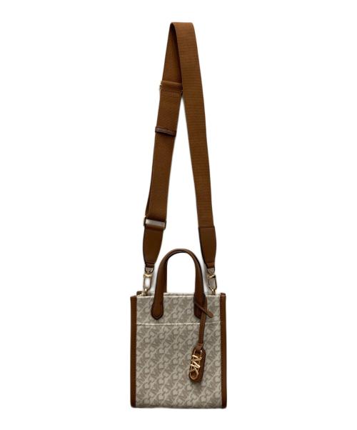 MICHAEL KORS（マイケルコース）MICHAEL KORS (マイケルコース) GIGI エンパイア シグネチャーロゴ ショッパートート ベージュの古着・服飾アイテム