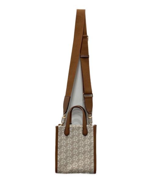 MICHAEL KORS（マイケルコース）MICHAEL KORS (マイケルコース) GIGI エンパイア シグネチャーロゴ ショッパートート ベージュの古着・服飾アイテム