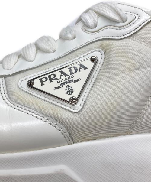 PRADA（プラダ）PRADA (プラダ) Prax 01 Re-Nylon ブラッシュドレザースニーカー ホワイト サイズ:7の古着・服飾アイテム
