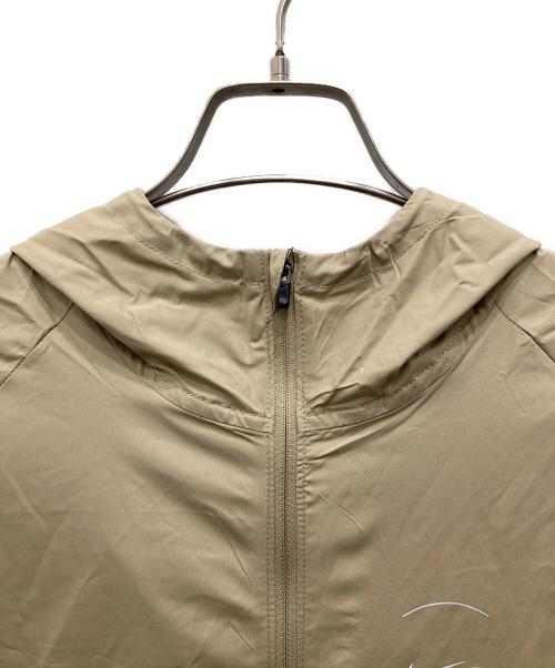 NIKE（ナイキ）NIKE (ナイキ) RPL マイラー SPNT フーディ ジャケット ベージュ サイズ:S 未使用品の古着・服飾アイテム