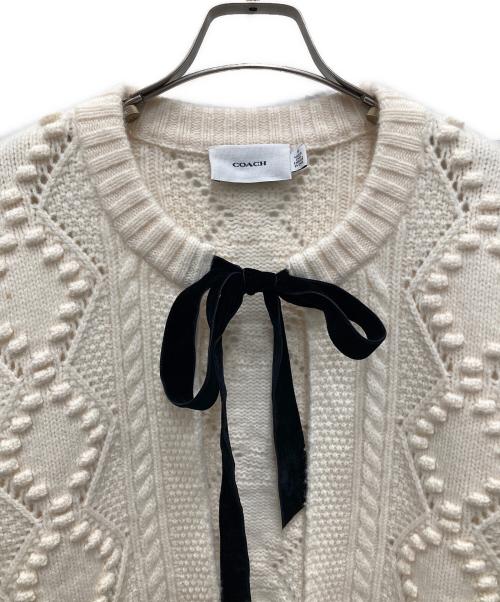 COACH（コーチ）COACH (コーチ) ケーブルニットカーディガン アイボリー サイズ:Mの古着・服飾アイテム