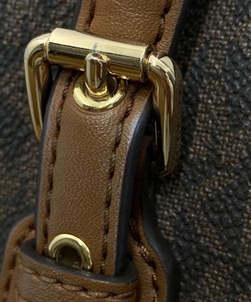 MICHAEL KORS（マイケルコース）MICHAEL KORS (マイケルコース) VOYAGER PVC EW シグネチャー トートバッグ ブラウン×ベージュの古着・服飾アイテム