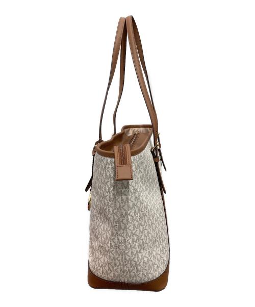 MICHAEL KORS（マイケルコース）MICHAEL KORS (マイケルコース) JET SET TRAVEL トートバッグ ベージュ×ブラウン 未使用品の古着・服飾アイテム