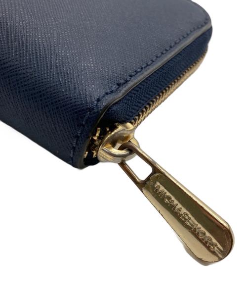 MICHAEL KORS（マイケル・コース）MICHAEL KORS (マイケルコース) ラウンドジップウォレット ネイビーの古着・服飾アイテム