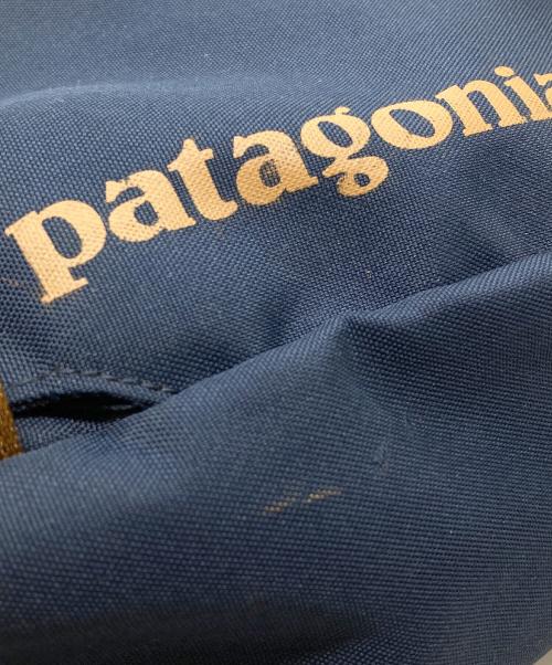 Patagonia（パタゴニア）Patagonia (パタゴニア) アトムスリング ボディバッグ ネイビーの古着・服飾アイテム