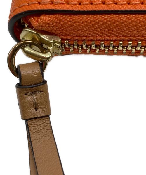 TORY BURCH（トリーバーチ）TORY BURCH (トリーバーチ) 長財布 オレンジの古着・服飾アイテム