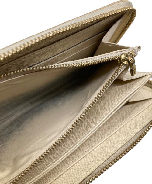 LOUIS VUITTON（ルイ ヴィトン）LOUIS VUITTON (ルイ ヴィトン) ラウンドファスナー財布 ベージュの古着・服飾アイテム