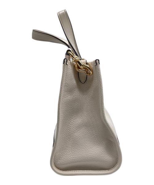 COACH（コーチ）COACH (コーチ) デンプシー キャリーオール ウィズ パッチ アイボリーの古着・服飾アイテム