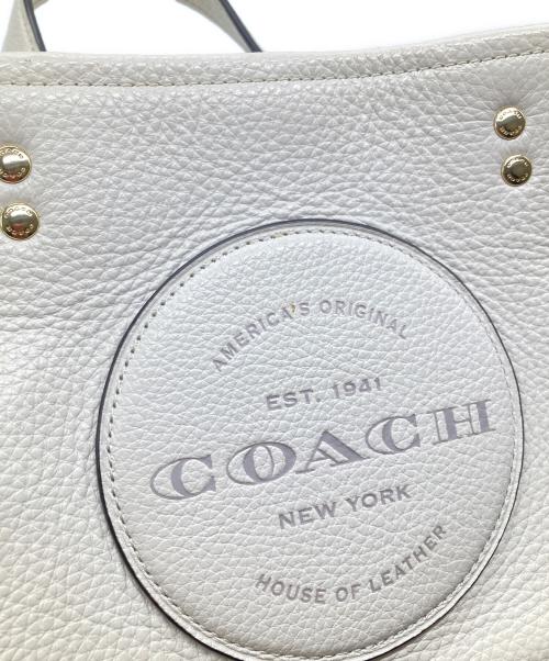 COACH（コーチ）COACH (コーチ) デンプシー キャリーオール ウィズ パッチ アイボリーの古着・服飾アイテム