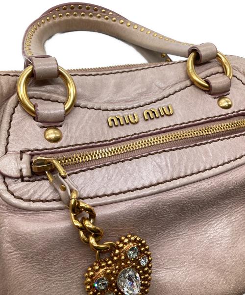 MIU MIU（ミュウミュウ）MIU MIU (ミュウミュウ) ハートチャーム2WAYバッグ ピンクの古着・服飾アイテム