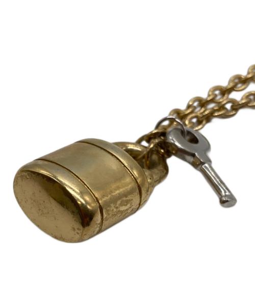 COACH（コーチ）COACH (コーチ) 南京錠モチーフネックレス ゴールドの古着・服飾アイテム