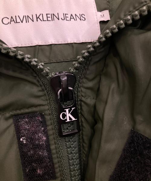 Calvin Klein Jeans（カルバンクラインジーンズ）Calvin Klein Jeans (カルバンクラインジーンズ) ダウンジャケット オリーブ サイズ:Mの古着・服飾アイテム