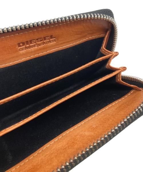 DIESEL（ディーゼル）DIESEL (ディーゼル) レザースタッズミニウォレット ブラックの古着・服飾アイテム