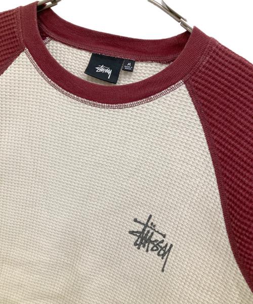 stussy（ステューシー）stussy (ステューシー) サーマルラグランカットソー ベージュ×レッド サイズ:Mの古着・服飾アイテム
