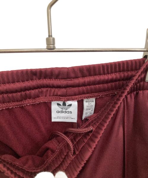 adidas（アディダス）adidas (アディダス) トラックパンツ レッド サイズ:Ｍの古着・服飾アイテム