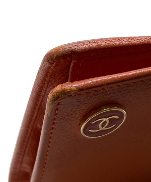 CHANEL（シャネル）CHANEL (シャネル) ココマークボタン2つ折り財布 オレンジの古着・服飾アイテム