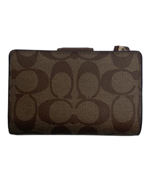 COACH（コーチ）COACH (コーチ) 2つ折り財布 ブラウンの古着・服飾アイテム