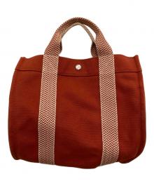 HERMES（エルメス）の古着「カンヌ/トートバッグ」｜オレンジ