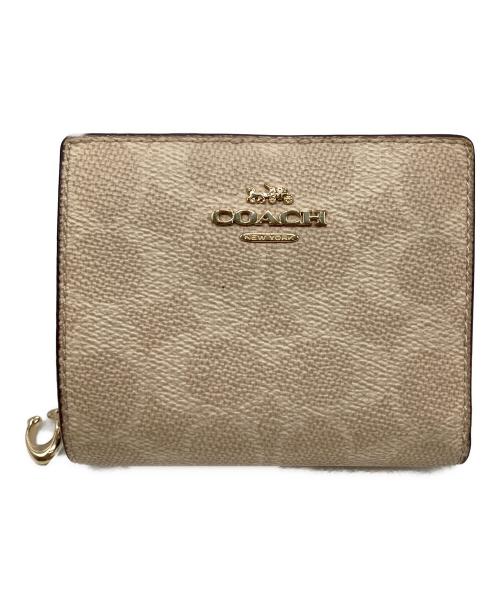 COACH（コーチ）COACH (コーチ) 2つ折り財布 ベージュの古着・服飾アイテム